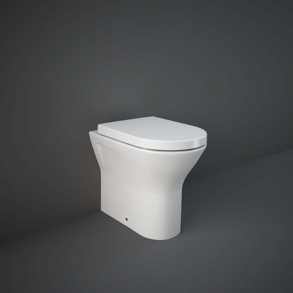 RAK Resort - Gloss White Extended Height Rimless Back to Wall Toilet with Wrap Over Soft Close Seat