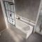 Milano Ballam - Modern Round Single Ended Shower Bath with Black Grid Bath Screen - Choice of Size and Panels