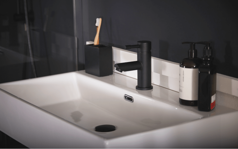 Milano Nero modern mono basin mixer tap on countertop basin. 